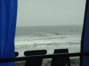 View of ocean through the window of our bus