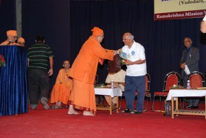 Anant Maharaj is giving mementos and gift to Uncle